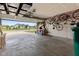Spacious garage interior showcasing ample storage, including overhead racks and hanging bike storage at 19387 Astoria Ave, Sheridan, IN 46069