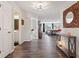 Spacious hallway featuring hardwood floors and an open floor plan at 19387 Astoria Ave, Sheridan, IN 46069