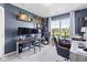 This home office features a guitar display, dual monitors, and a comfortable desk chair at 19387 Astoria Ave, Sheridan, IN 46069