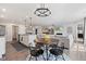 Open floor plan featuring the dining area, kitchen, and view to the spacious living room at 19387 Astoria Ave, Sheridan, IN 46069