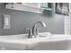 Close up of the bathroom vanity, white porcelain sink and faucet at 1944 Union St, Columbus, IN 47201