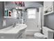 Updated bathroom with white subway tile, gray walls, and updated fixtures at 1944 Union St, Columbus, IN 47201