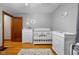 A bedroom boasts hardwood floors and plenty of natural light at 1944 Union St, Columbus, IN 47201