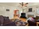 Cozy living room with hardwood floors, a decorative fireplace, and comfortable seating at 1944 Union St, Columbus, IN 47201