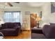 Inviting living room with hardwood floors, neutral walls, and ample natural light at 1944 Union St, Columbus, IN 47201