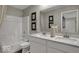 Bright bathroom with a double sink vanity, bathtub-shower combo, and neutral decor at 19791 Moorpark Lndg, Noblesville, IN 46062