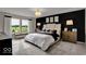 Luxurious bedroom suite with a large bed, stylish decor, and ample natural light at 19791 Moorpark Lndg, Noblesville, IN 46062
