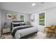 Inviting bedroom featuring bright windows, modern furniture, and a relaxing ambiance at 1993 Mulberry St, Noblesville, IN 46060