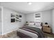Cozy bedroom with a comfortable bed, soft lighting, and tasteful wall art at 1993 Mulberry St, Noblesville, IN 46060