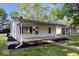 Beautiful single-Gathering home with a covered front porch and well manicured lawn at 1993 Mulberry St, Noblesville, IN 46060