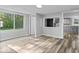 Open living room showcasing hardwood floors, natural light, and an open floor plan at 1993 Mulberry St, Noblesville, IN 46060