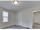Bedroom featuring fresh paint, natural light and gray vinyl plank flooring at 2245 N Ritter Ave, Indianapolis, IN 46218