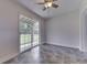 Bedroom with tile flooring and sliding glass door to backyard at 2245 N Ritter Ave, Indianapolis, IN 46218