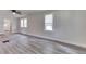 Inviting living room with neutral walls and luxury vinyl flooring at 2245 N Ritter Ave, Indianapolis, IN 46218