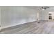 Inviting living room with neutral walls and luxury vinyl flooring at 2245 N Ritter Ave, Indianapolis, IN 46218