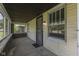 View of the home's screened in porch with views to the front yard at 2245 N Ritter Ave, Indianapolis, IN 46218