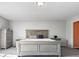Spacious main bedroom with soft carpeting, natural light, and a neutral color scheme at 2426 Autumn Rd, Indianapolis, IN 46229