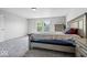 Comfortable main bedroom with large windows, soft carpeting, and ample space at 2426 Autumn Rd, Indianapolis, IN 46229