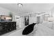 Cozy bedroom with stylish decor, barn door access, and comfortable bedding at 2717 Reflection Way, Greenwood, IN 46143