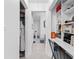 Bright hallway featuring closet, shelves, and bathroom entrance at 2717 Reflection Way, Greenwood, IN 46143