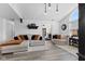 Open-concept living room with modern decor, natural light, and neutral color palette at 2717 Reflection Way, Greenwood, IN 46143
