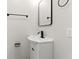 Modern bathroom featuring a sleek vanity, a stylish faucet, and a minimalist design at 2719 Denison St, Indianapolis, IN 46241