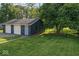 Detached two-car garage with ample space and a well-manicured lawn at 2719 Denison St, Indianapolis, IN 46241
