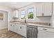 Bright kitchen featuring granite countertops, stainless steel appliances, and stylish cabinets at 2719 Denison St, Indianapolis, IN 46241