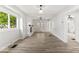 A bright and airy living room featuring an elegant fireplace, recessed lighting, and natural light at 2719 Denison St, Indianapolis, IN 46241