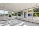Enclosed sunroom with many windows that provide natural light at 2719 Denison St, Indianapolis, IN 46241