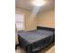 Bedroom with a large bed and natural lighting at 2954 N Drexel Ave, Indianapolis, IN 46218
