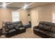Comfortable living room features recliner seating and neutral wall color at 2954 N Drexel Ave, Indianapolis, IN 46218
