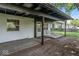 This home has a black porch roof and a backyard swing at 3529 Hunt St, Plainfield, IN 46168