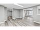 Spacious basement with gray walls, wood flooring, and ample natural light at 3529 Hunt St, Plainfield, IN 46168