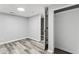 Bedroom with gray walls, wood floors, closet, and a neutral color palette at 3529 Hunt St, Plainfield, IN 46168