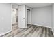 Bedroom with gray walls, wood floors, closet, and a neutral color palette at 3529 Hunt St, Plainfield, IN 46168