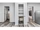 Well-organized pantry offers ample storage with shelves and space for a microwave or toaster at 3529 Hunt St, Plainfield, IN 46168