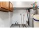 Utility room featuring a water heater, shelving, and wood-look flooring at 3529 Hunt St, Plainfield, IN 46168