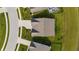 Aerial view of a home showcasing its roof, driveway, landscaping, and surrounding neighborhood at 3839 Albert Ln, Bargersville, IN 46106
