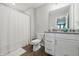 Modern bathroom featuring a toilet, vanity with storage, and a shower with a white shower curtain at 3839 Albert Ln, Bargersville, IN 46106