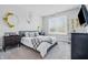 Bright bedroom with natural light, and decorated with dream catcher and floral decor at 3839 Albert Ln, Bargersville, IN 46106