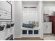 Charming mudroom with built-in bench, storage cubbies, and wall hooks, offering a welcoming and organized entry at 3839 Albert Ln, Bargersville, IN 46106