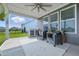 Covered outdoor patio featuring comfortable seating and a ceiling fan, perfect for relaxing outdoors at 3839 Albert Ln, Bargersville, IN 46106