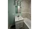 Bathroom featuring an updated vanity with a tub and shower at 4715 Normal Ave, Indianapolis, IN 46226