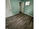 Bedroom featuring a large closet with lots of storage and painted walls at 4715 Normal Ave, Indianapolis, IN 46226