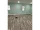 Bedroom with neutral walls and wood look floors, ready for personalization at 4715 Normal Ave, Indianapolis, IN 46226