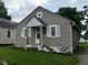 Charming single Gathering home featuring a gable roof, siding, and a small front porch at 4715 Normal Ave, Indianapolis, IN 46226