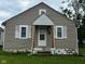 Charming single Gathering home featuring a gable roof, siding, and a small front porch at 4715 Normal Ave, Indianapolis, IN 46226