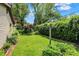 Lush backyard with clothesline, established greenery, and tranquil space at 4770 Willow Rd, Zionsville, IN 46077
