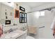 Well-lit bathroom featuring a modern vanity, shower, and decorative accents for a cozy feel at 4770 Willow Rd, Zionsville, IN 46077